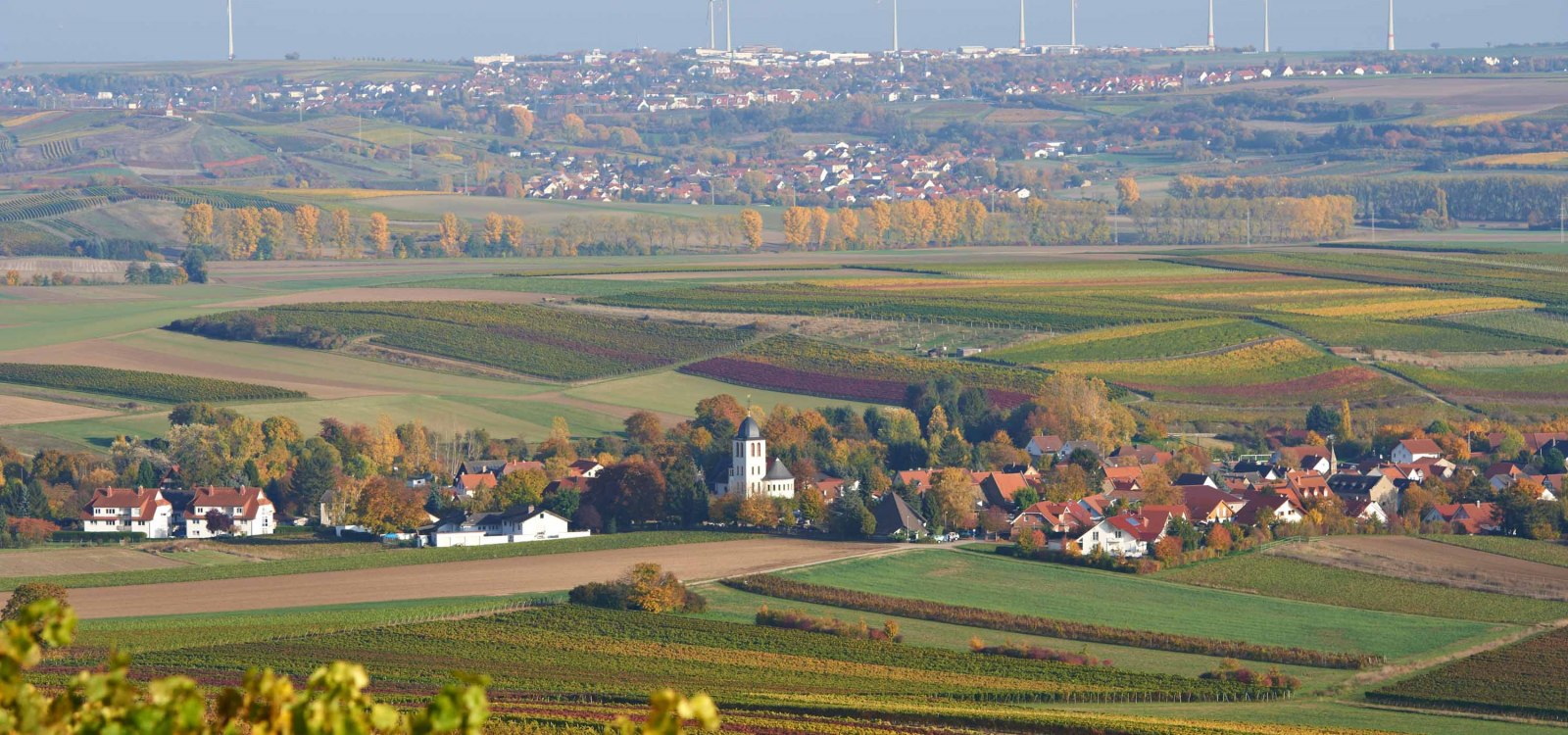 Landscape with local church and wind turbines, © Robert Dieth
